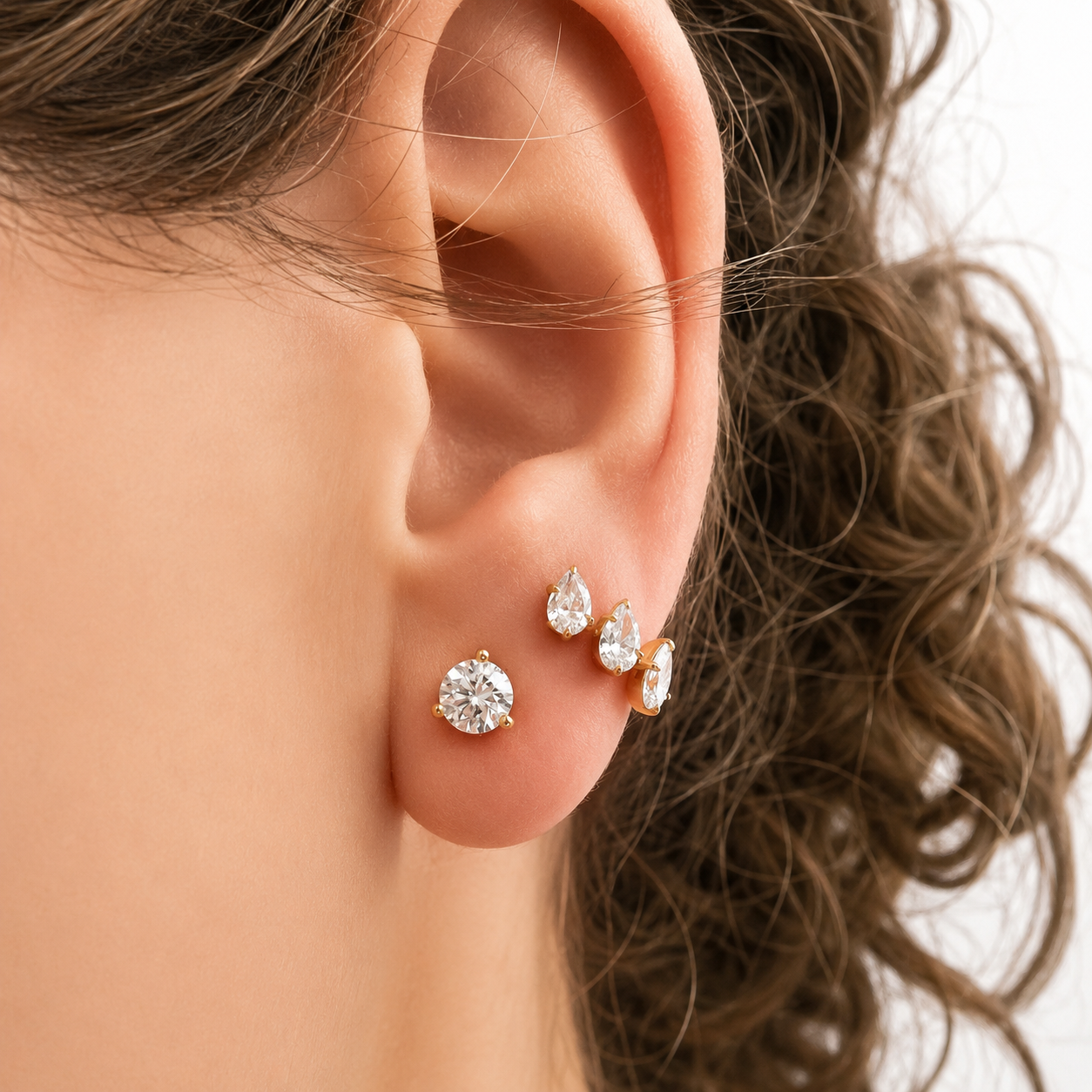 Pear Huggies in 14K Yellow Gold