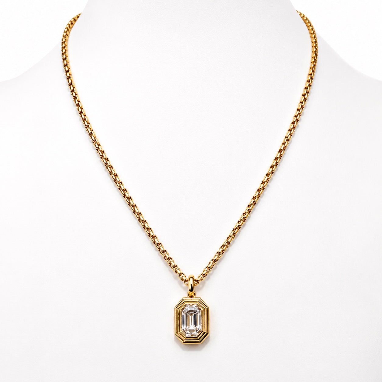 Elongated Emerald Cut Triple Bezel Pendant in Yellow Gold