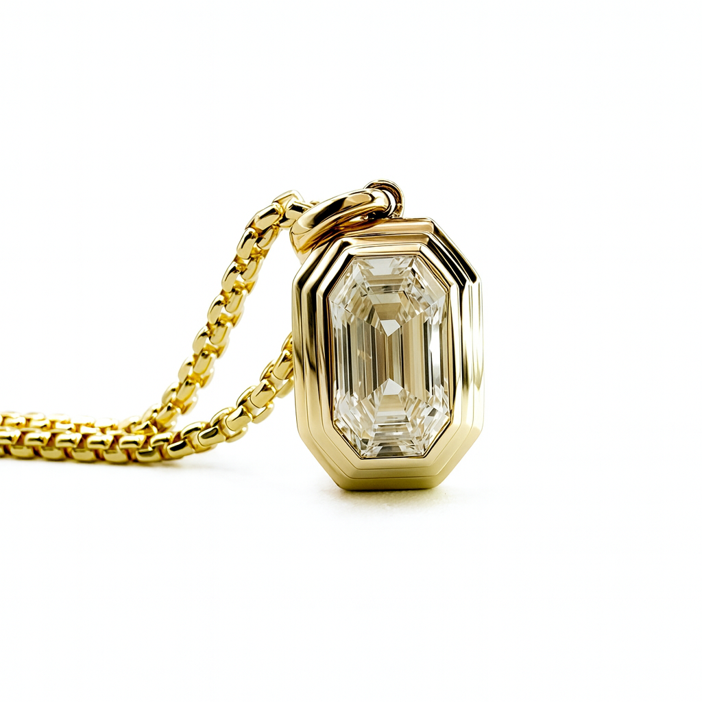 Elongated Emerald Cut Triple Bezel Pendant in Yellow Gold