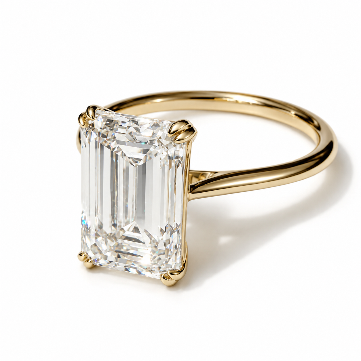 The Fifth Avenue 4ct Emerald Cut Solitaire in 14K Yellow Gold
