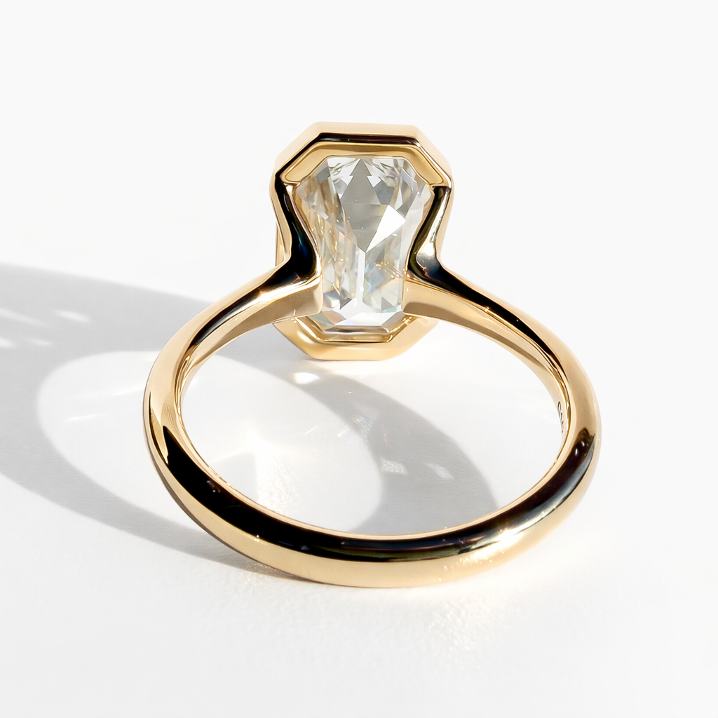 The Half Step 6ct Emerald Cut Solitaire in 14K Yellow Gold