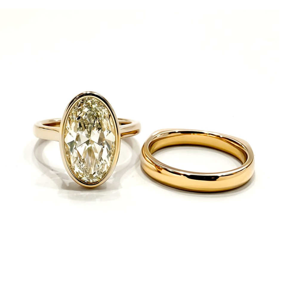 Antique Cut Elongated Oval Bezel Engagement Ring Set