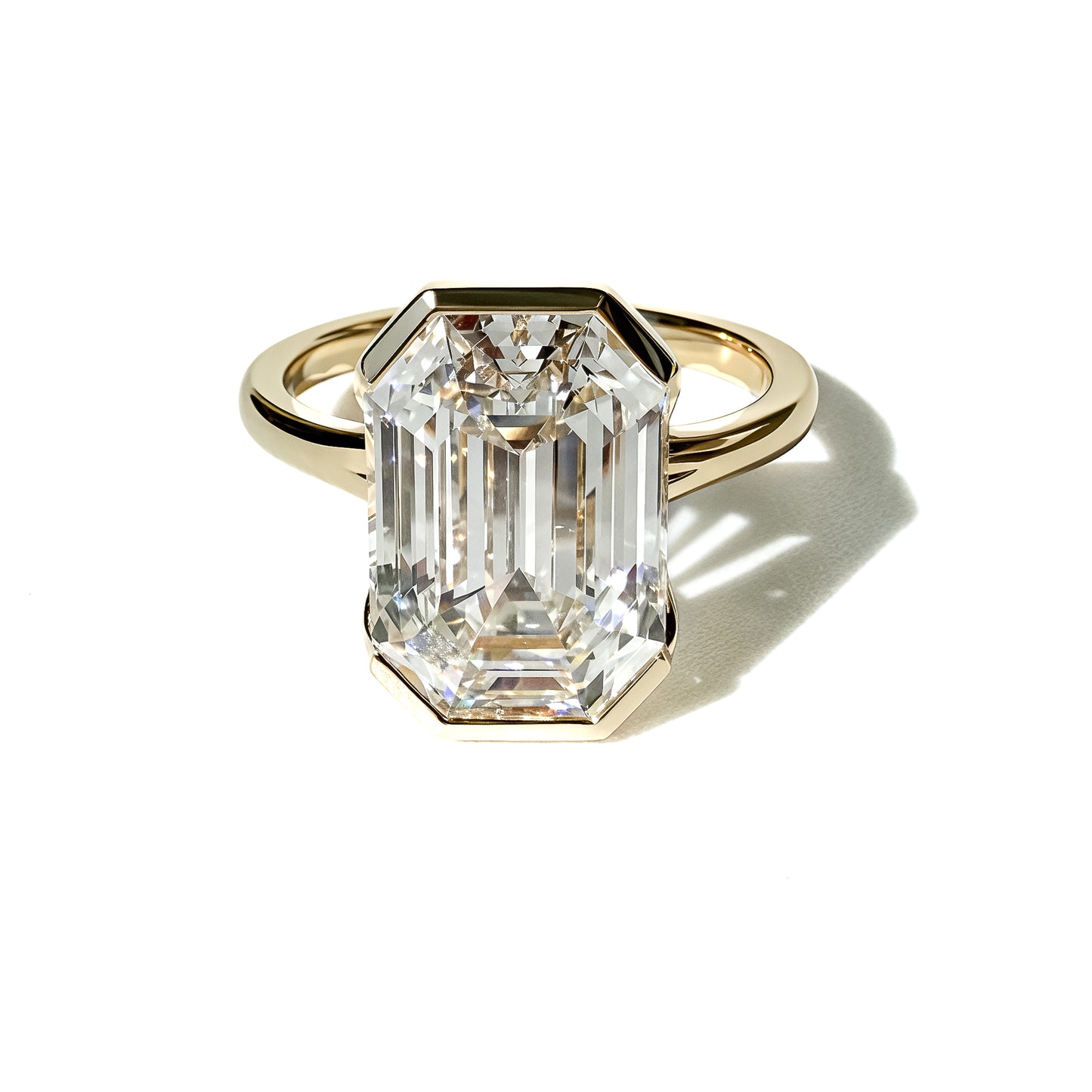 The Half Step 6ct Emerald Cut Solitaire in 14K Yellow Gold