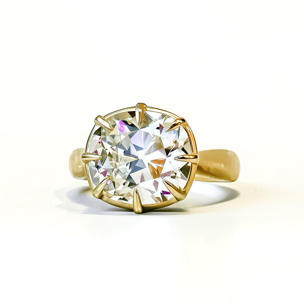 OId mine cut cushion in chunky collet setting, 14K yellow gold