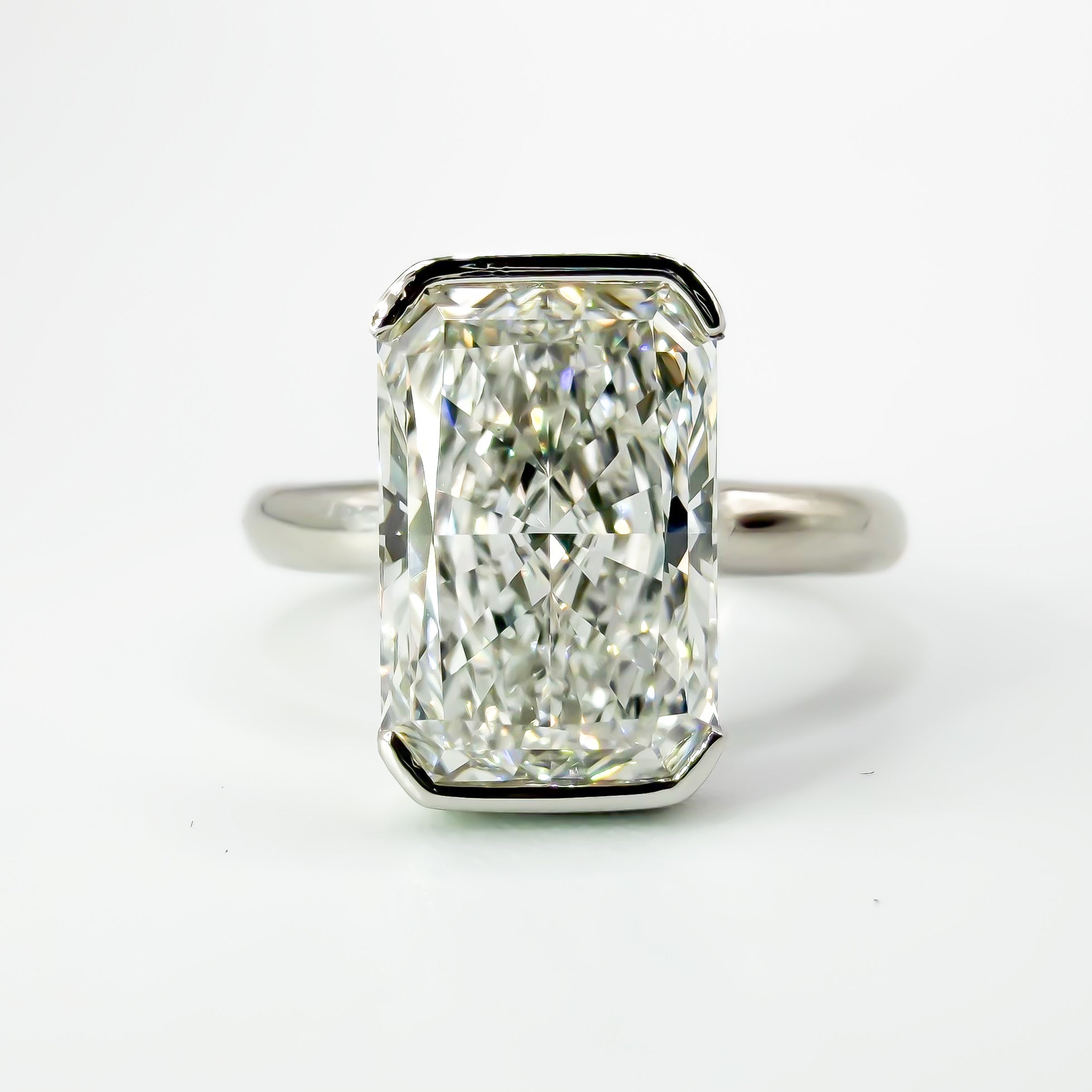 Radiant Half Bezel Solitaire in Platinum