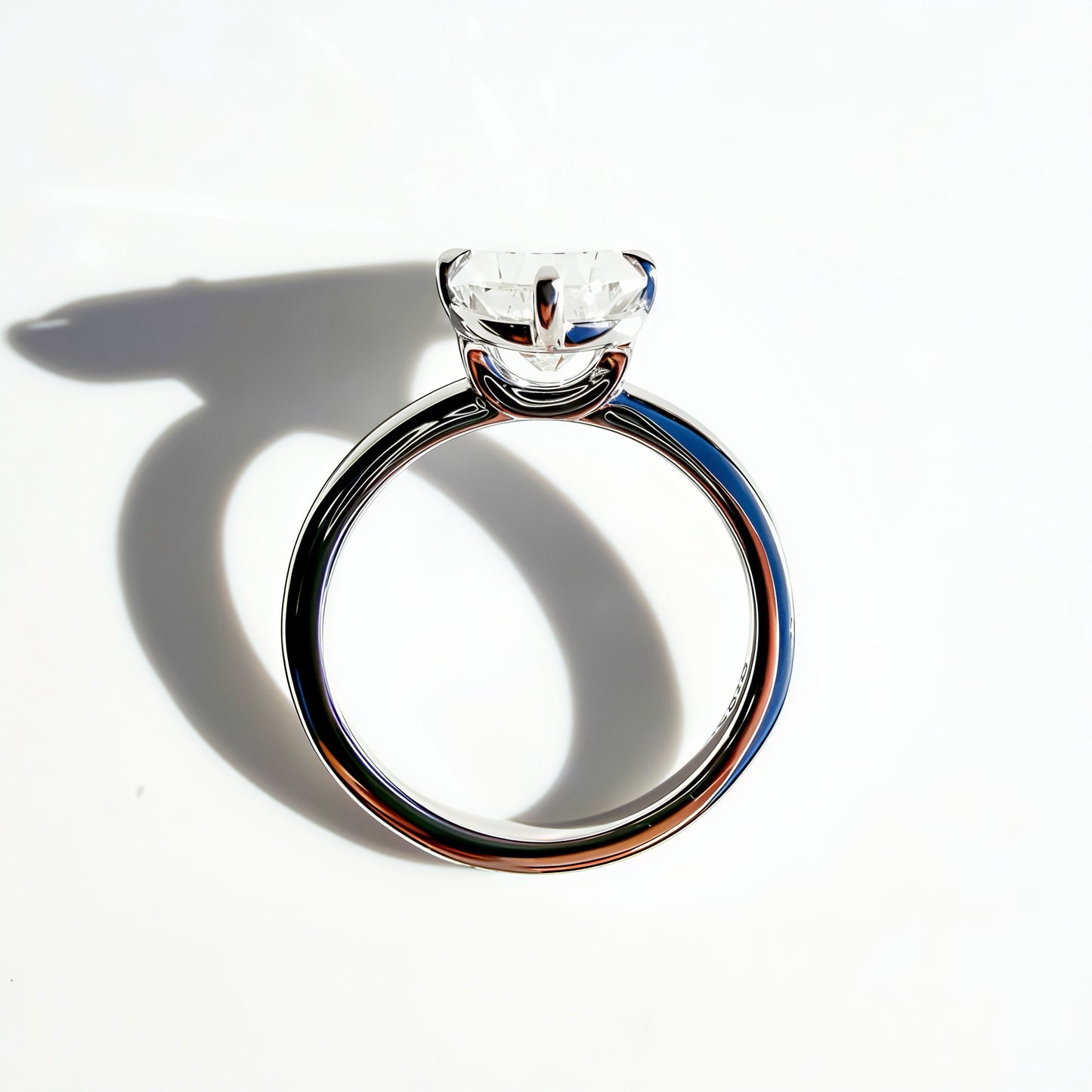 Compass Set Antique Cut Pear Diamond Ring in Platinum