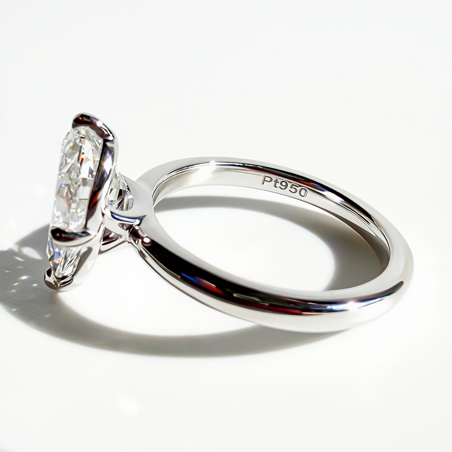 Compass Set Antique Cut Pear Diamond Ring in Platinum