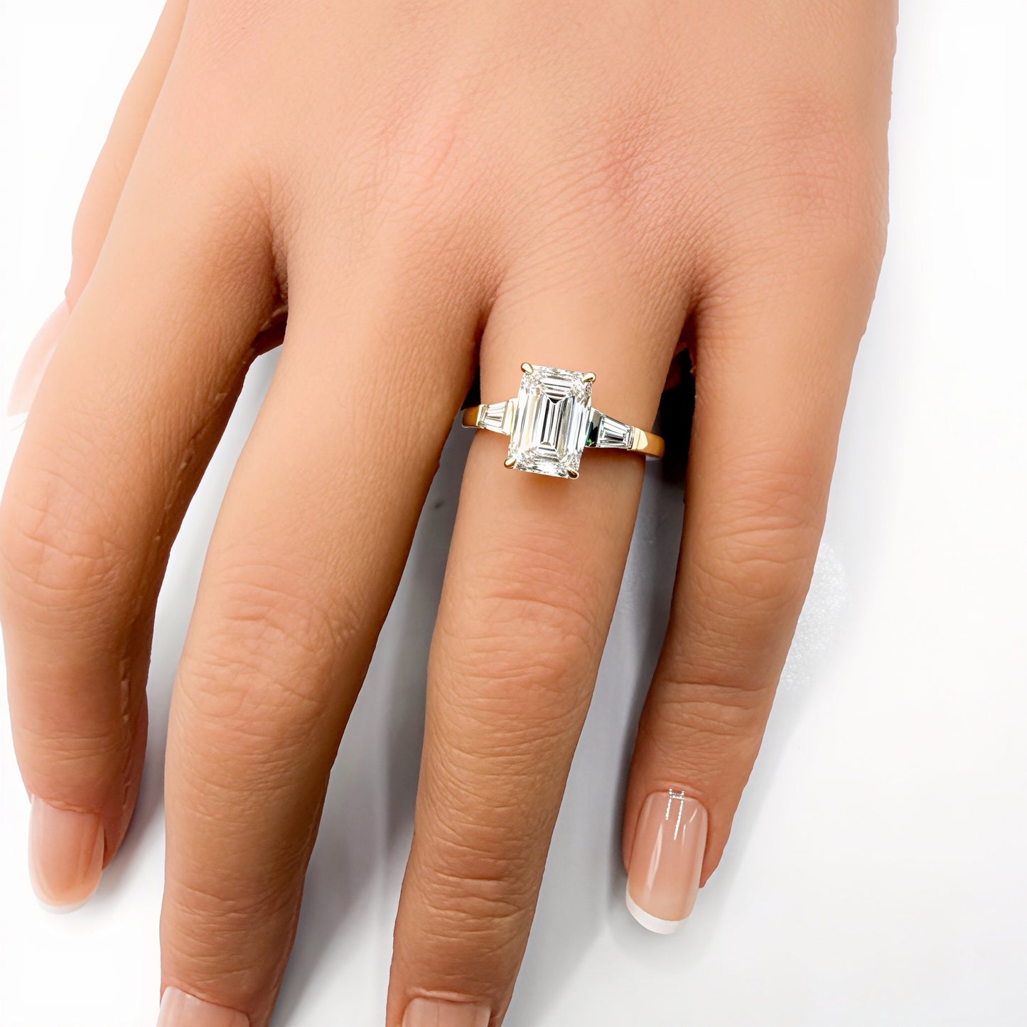 Emerald Cut with Tapered Baguettes in 14K Yellow Gold