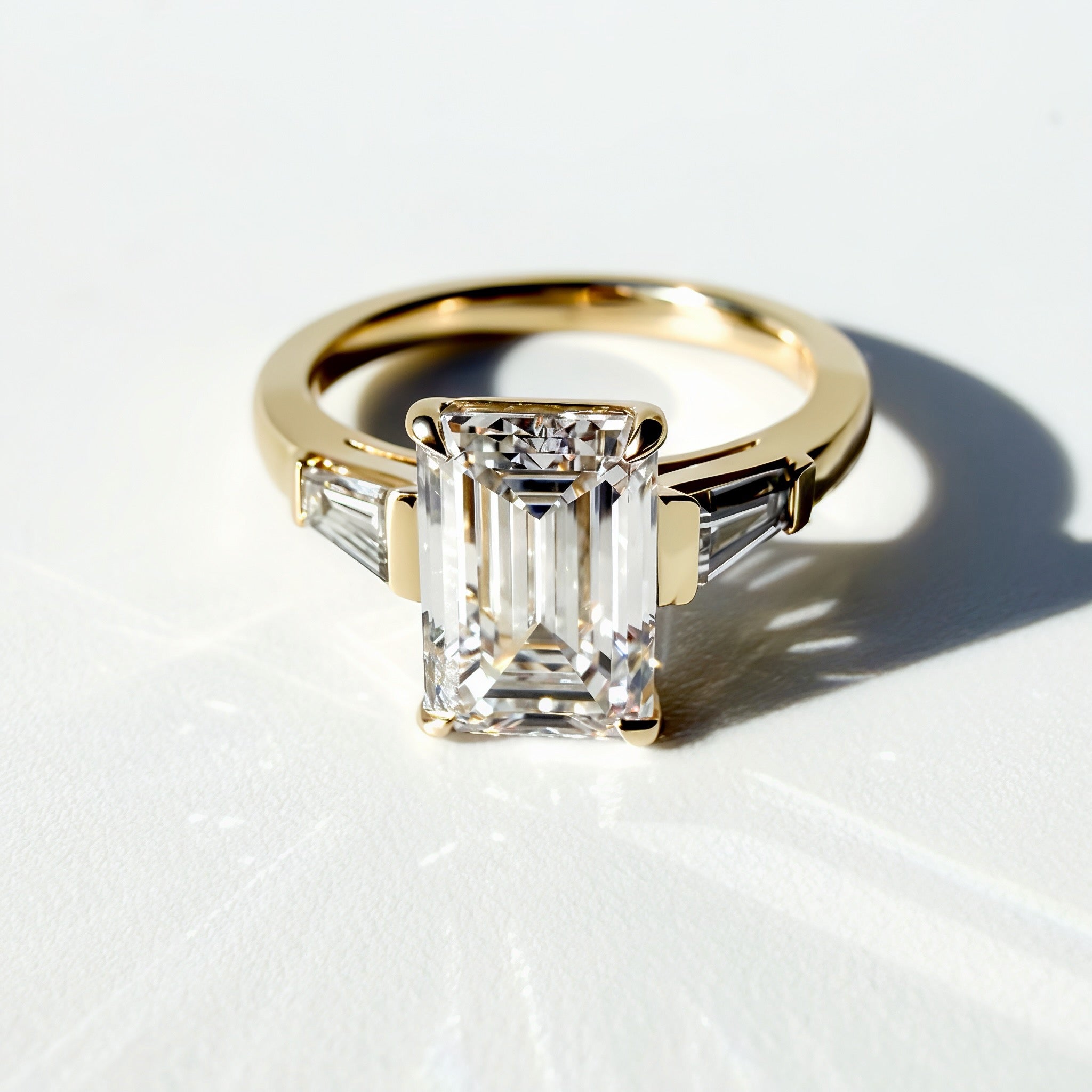 Emerald Cut with Tapered Baguettes in 14K Yellow Gold