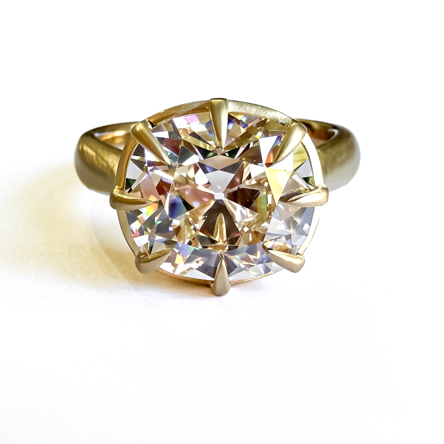 OId mine cut cushion in chunky collet setting, 14K yellow gold