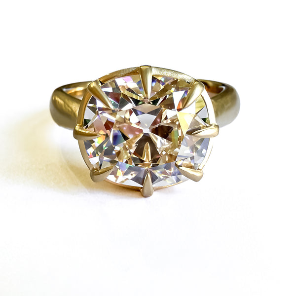 OId mine cut cushion in chunky collet setting, 14K yellow gold