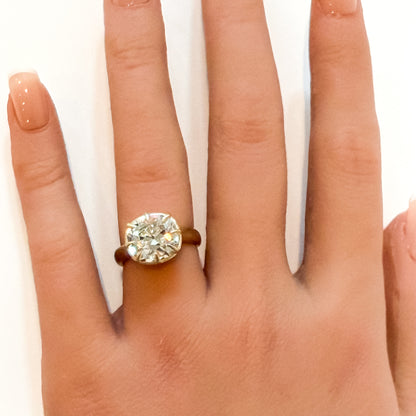OId mine cut cushion in chunky collet setting, 14K yellow gold