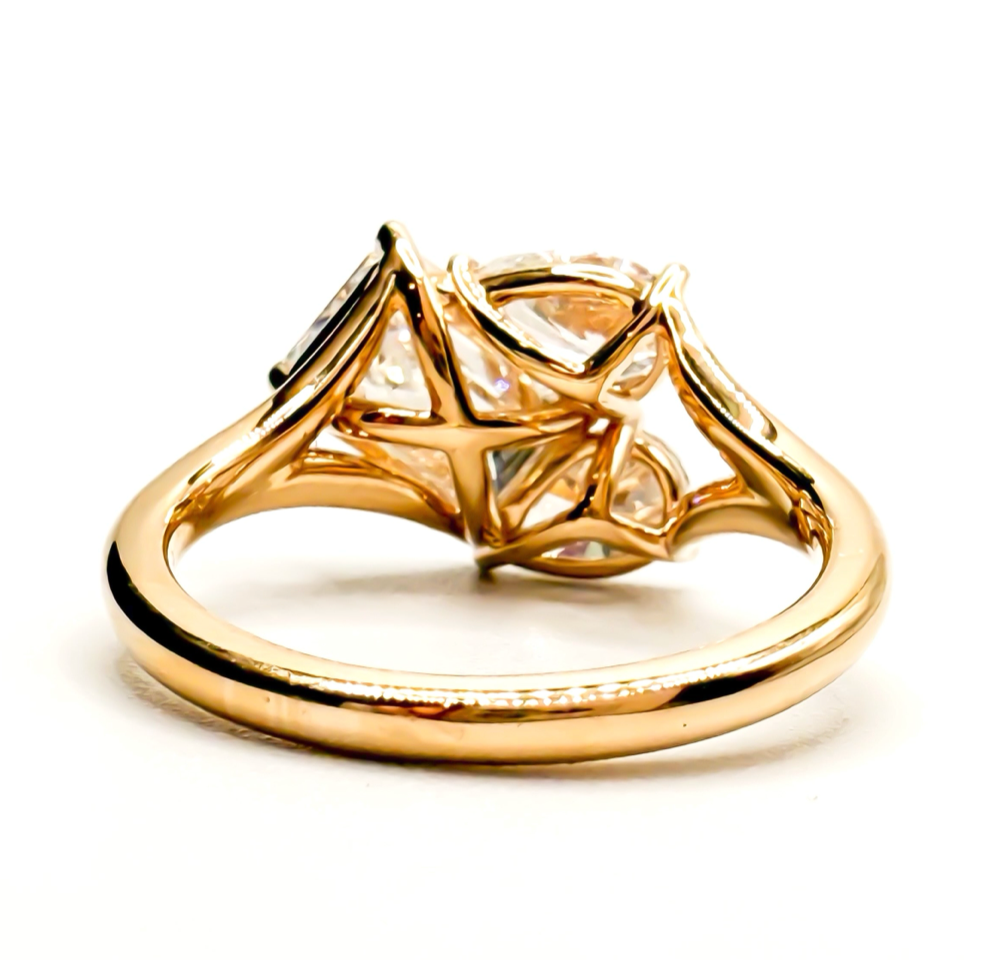 3ct Emerald and Pear Three Stone Ring in 14K Yellow Gold