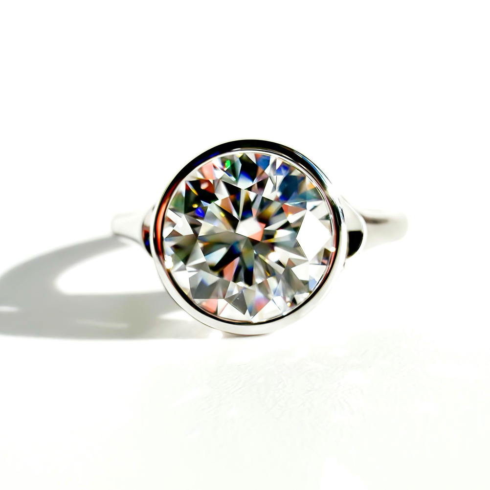 The Sunroof 3.2ct E VVS2 Round Brilliant Cut Bezel Solitaire in 14K White Gold