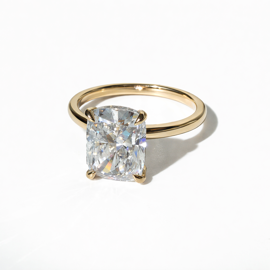 The Understory 3.5ct E VVS2 Cushion Solitaire in 14K Yellow Gold