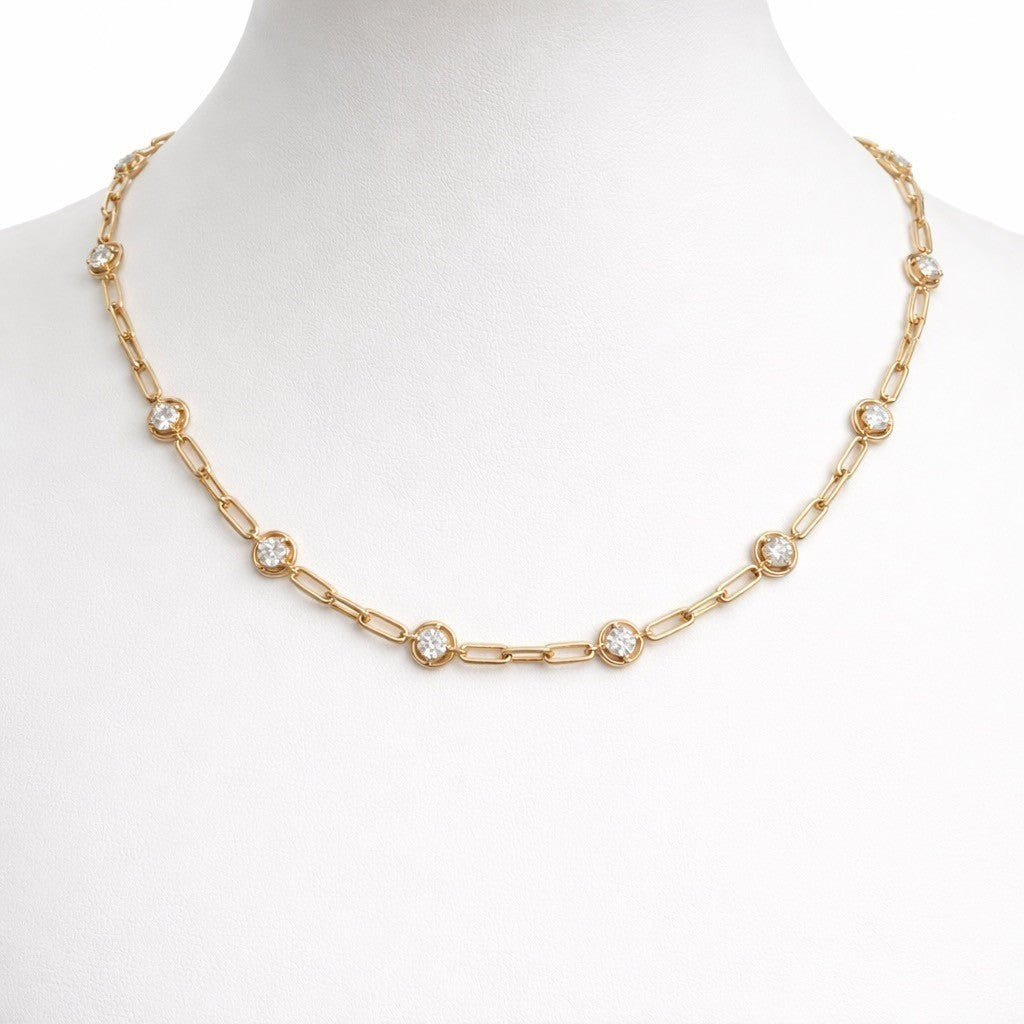 14K gold paperclip link chain necklace featuring 3.4cts of bezel-set round brilliant diamonds.