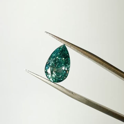 3.03ct Fancy Vivid Bluish Green VS2 IGI Certified Modified Brilliant Cut Pear Lab Diamond